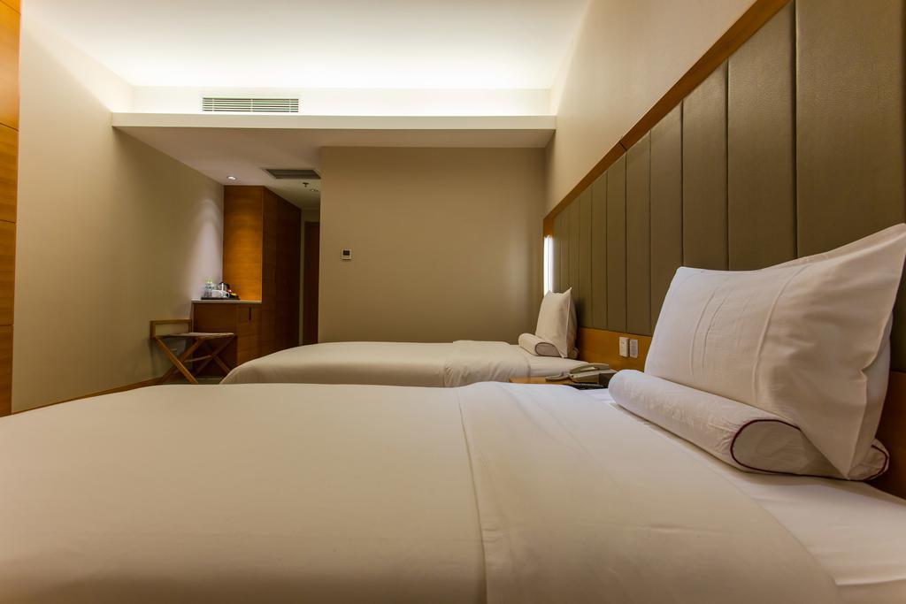 Ji Hotel Wuhan Guanggu Plaza Quarto foto